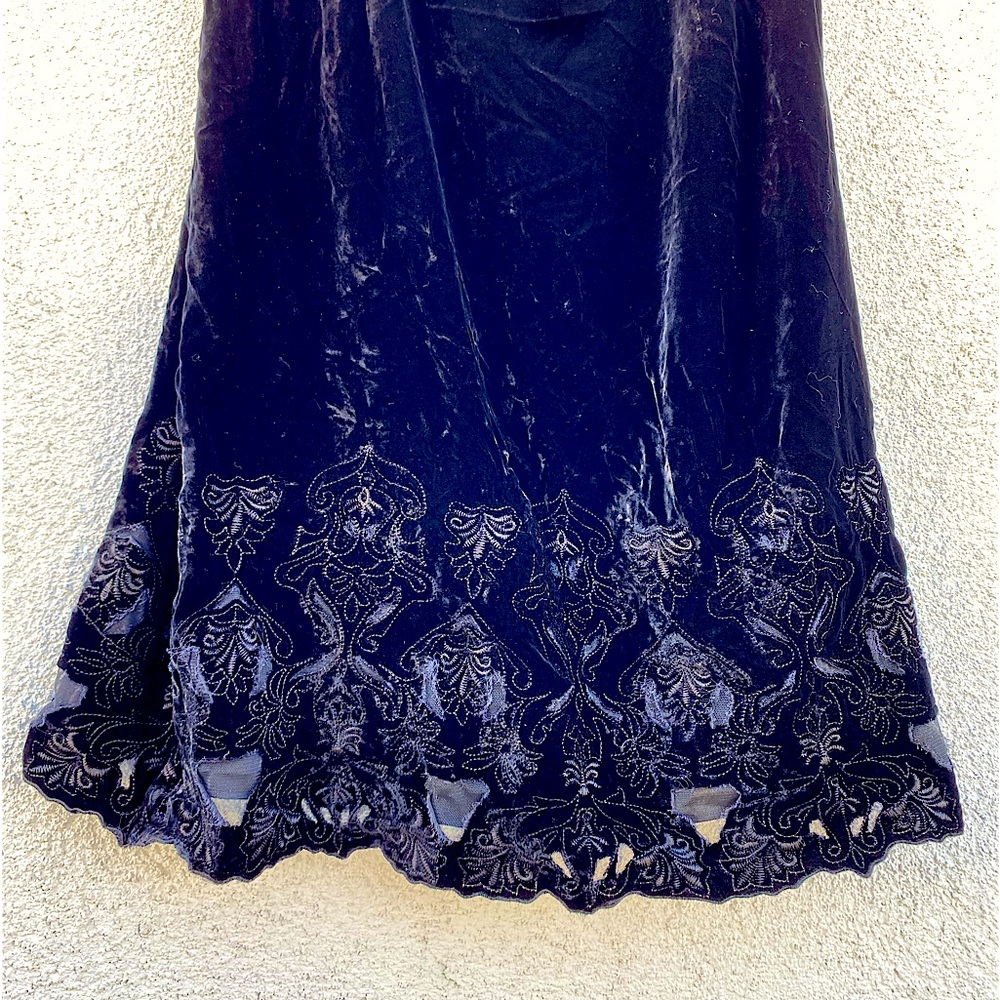 Tahari Dress, Black Velvet sleeveless, cut-out design, bottom of the dress.